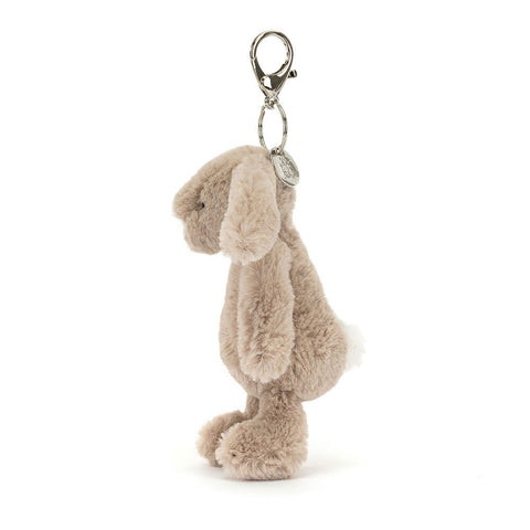 Image shows a side view of the stuffed bunny keychain