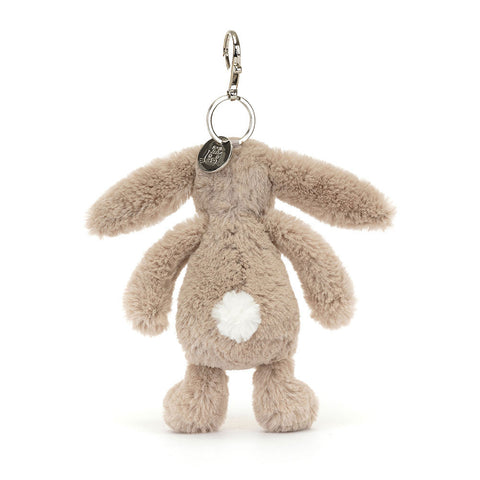 Image shows a back view of the stuffed beige bunny keychain