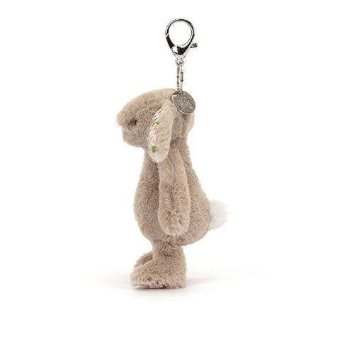Image shows a side view of the stuffed bunny keychain