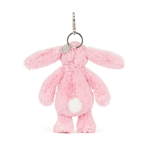 Back view of a Pink plush bunny keychain on a white background