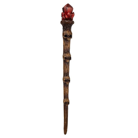 Image shows a brown magic wand with a red crystal at the end. It has 4 skulls going down the wand.