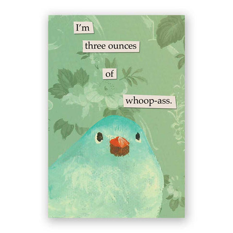 Image shows a magnet with a green floral background and a small blue bird. Text reads "I'm three ounces of whoop-ass"