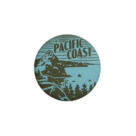 Round magnet with 'The Pacific Coast' design on a white background