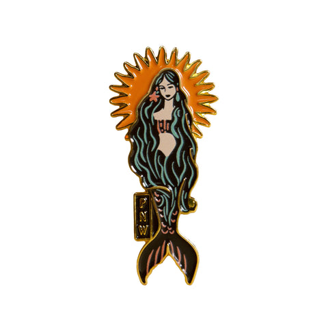 Enamel magnet with a design of a mermaid with a sunburst behind her on a white background