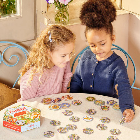 Image shows two young girls playing the matching game