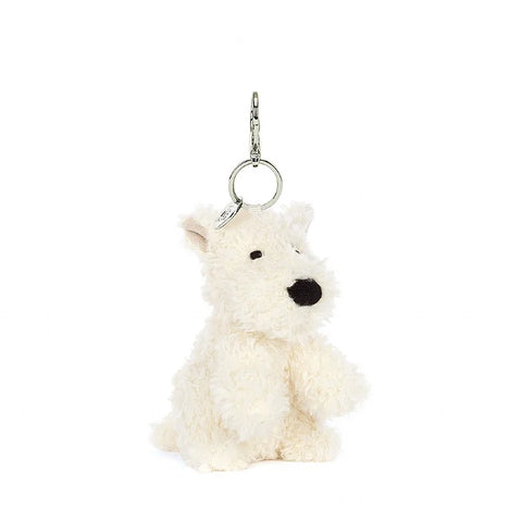 A stuffed seated white Scottish Terrier keychain