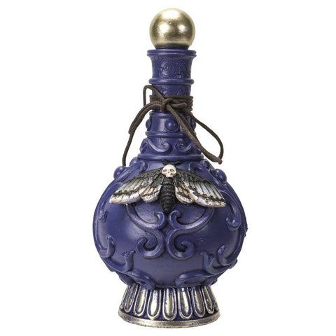 Image shows a purple bottle decorated with filigree. It has a gold ball on top and a death head moth on the front.