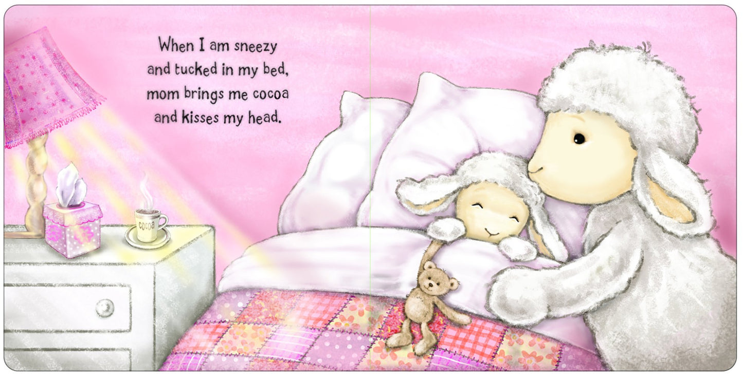 Mom lamb tucking baby lamb into bed. Text reads "when I am sneezy and tucked in bed. mom brings me cocoa and kisses my head."