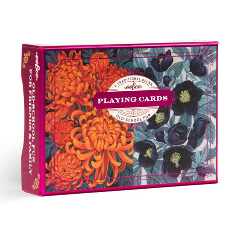 Image shows a box for two decks of playing cards. One has orange flowers and the other has black flowers with blue leaves.
