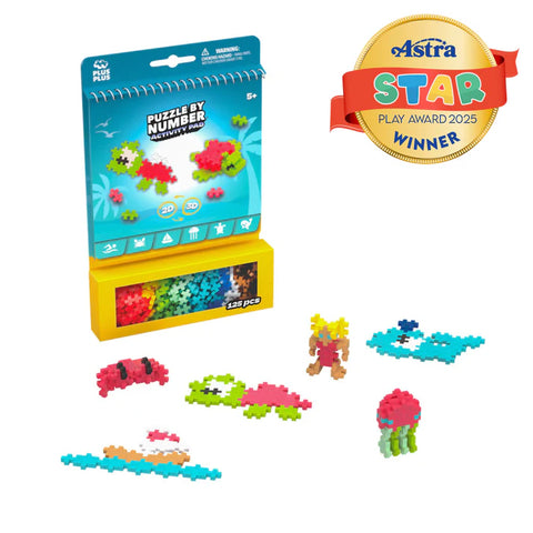 Children's ocean themed puzzle set with colorful pieces and packaging, featuring an Astra Star Play Award badge.