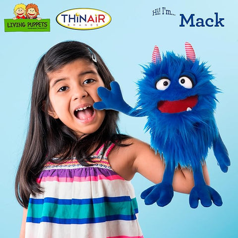 Image shows a young child playing with the hand puppet