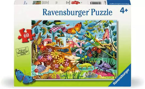 Image shows a box for a 60 piece puzzle. It is a backyard setting with colorful plants and bugs.