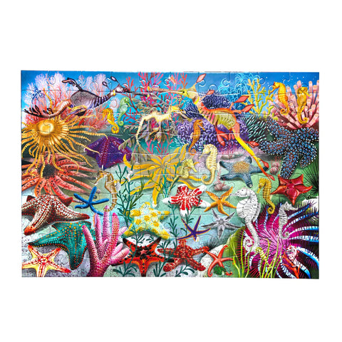 Image shows the completed puzzle which shows seahorses, sea stars, and sea slugs.