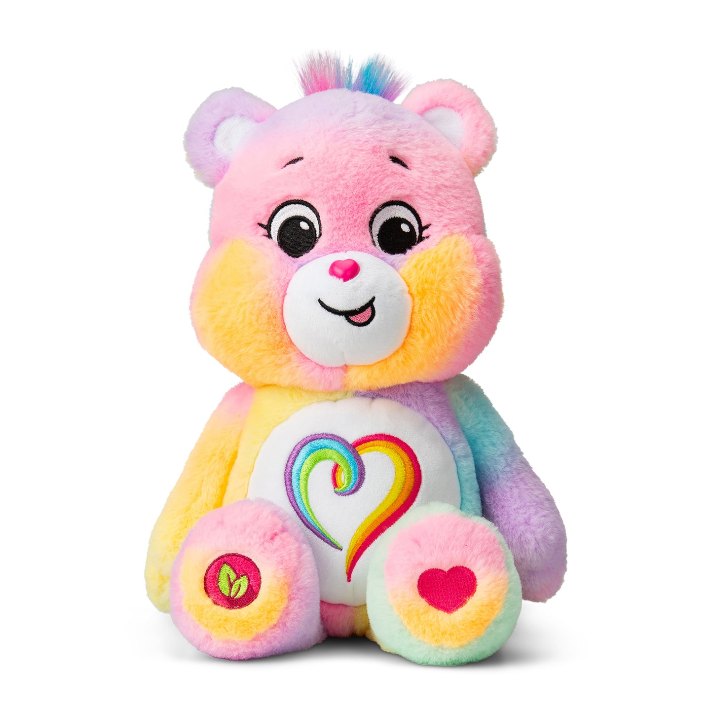 Image shows a pastel colored Care Bear with an embroidered heart on its belly