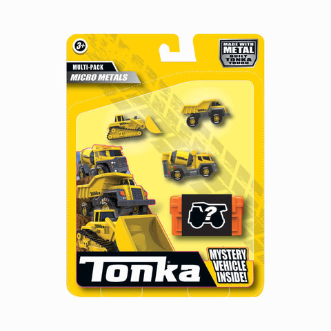 Image shows a miniature bulldozer, dump truck, and cement mixer in its packaging