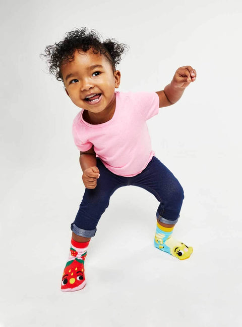 Image shows a female toddler wearing the socks