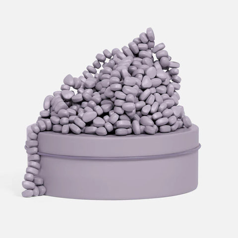 Image shows a lavender-colored tin with lavender-colored magnetic beads stacked on top