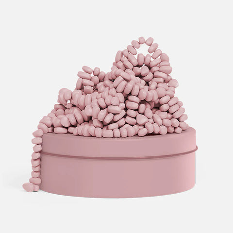 Image shows a rose-colored tin with rose-colored magnetic beads on top
