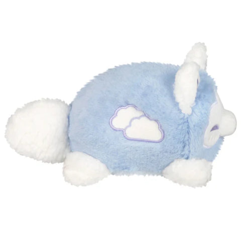 A side view of the cloud-themed stuffed kitsune. It has two embroidered clouds on its side.