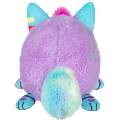 A back view of the lavender stuffed kitsune. It has a fluffy teal and seafoam green tail