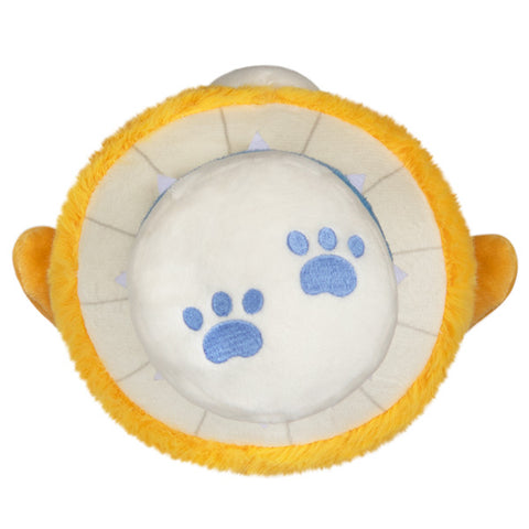 Image shows a bottom-up view of the stuffed dog mushroom. It has blue paw prints on the bottom.