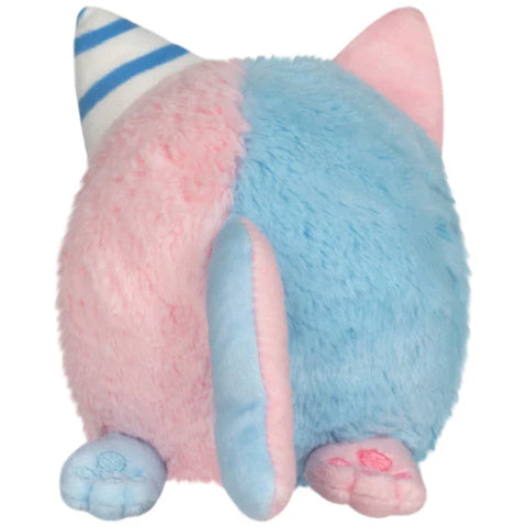 A back view of the plush kitty. Half is pink, half is blue, with opposing colors on the tail, paws, and ears.