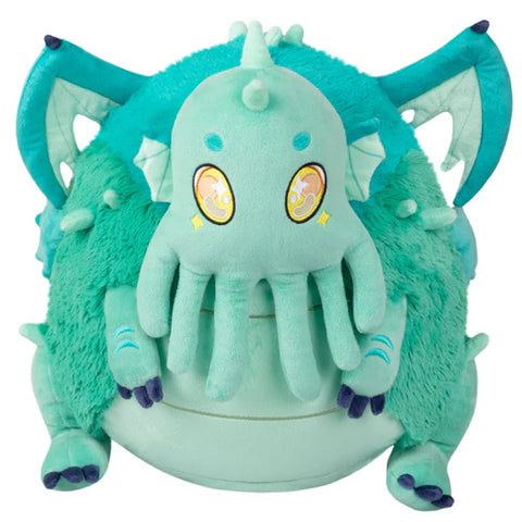 Image shows a stuffed teal-colored baby Cthulu