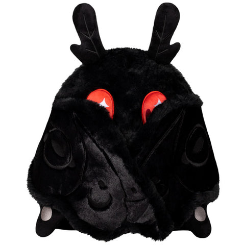 A front view of the plush baby mothman with his wings closed. They are held closed by magnets.