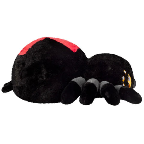 Image shows a side view of the stuffed Black Widow