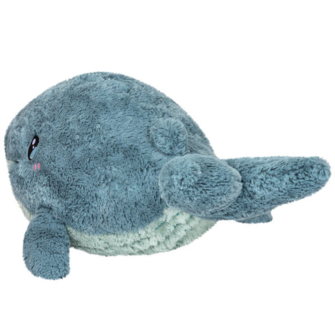 A back-angle view of the plush blue whale