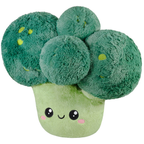 A plush toy designed to look like a smiling broccoli with green and yellow accents.