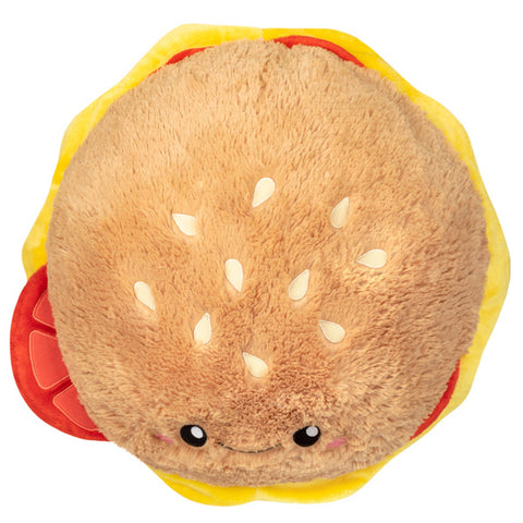 Image shows a top-down view of the stuffed cheeseburger. It has sesame seeds in the bun.