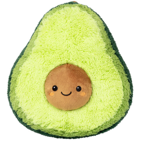 Image shows a stuffed avocado with a happy face in the pit