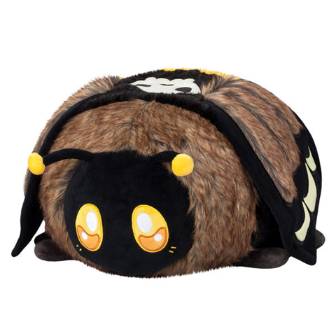 A front view of the plush Death's Head Hawkmoth. Its body and wings are brown and fuzzy.