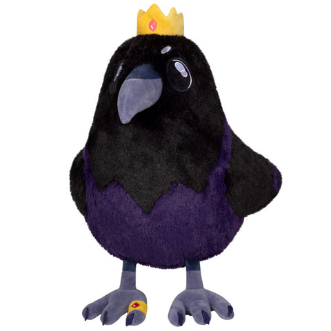 A plush toy resembling a black raven with a crown, designed to look like a king. The toy has a soft, fluffy texture and is detailed with a purple breast and gray beak and feet.