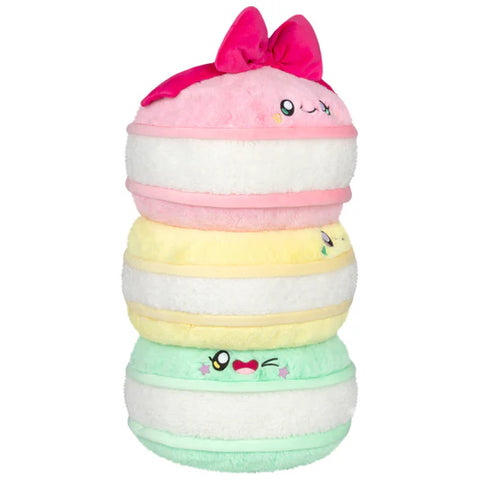 Image shows a side view of the stuffed macarons