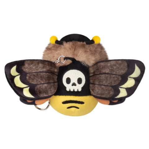 A plush toy resembling a Death's Head Hawkmoth with brown, black, and yellow coloring, featuring a skull pattern on the back and a keychain attachment.