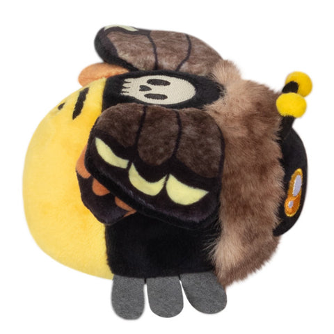 A side view of the plush Death's Head Hawkmoth keychain