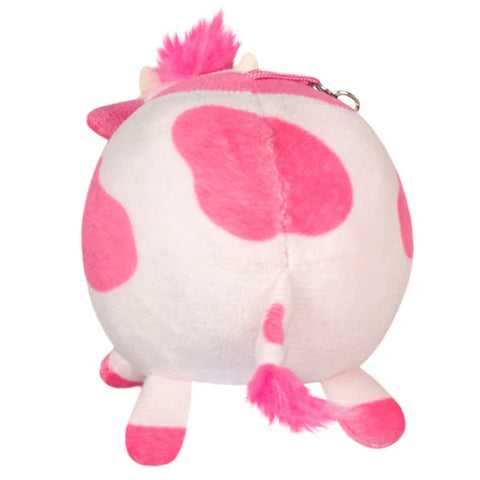 Image shows a back view of the stuffed pink cow keychain