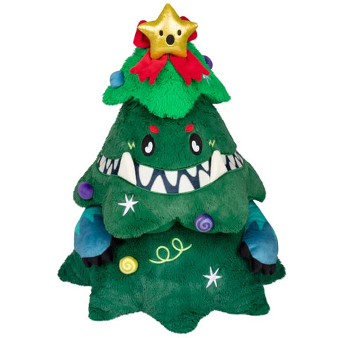 A Christmas tree with teeth, arms, various shapes scattered around the tree, and a star with a shocked face.