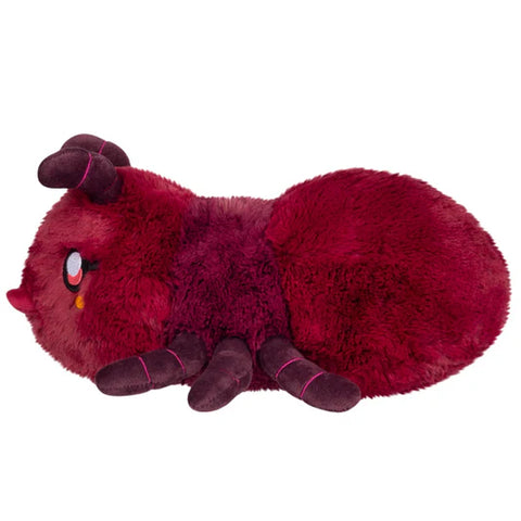 A side view of the stuffed ant