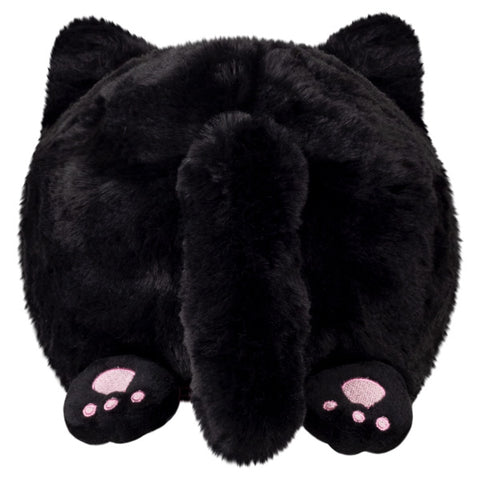 A back view of the plush black kitty. It has pink paw pads.