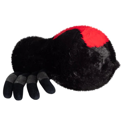 Image shows a side view of the stuffed black widow spider