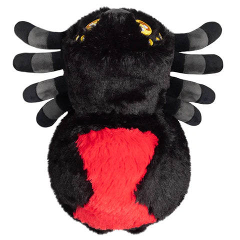 Image shows a top-down view of the stuffed black widow spider