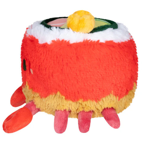 Image shows a side view of the stuffed crab roll