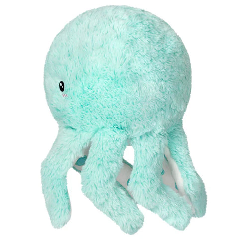 Image shows a side view of the stuffed mint octopus