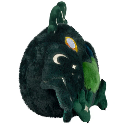 A side view of the dark forest mothman