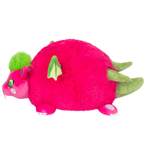 A side view of the plush dragon