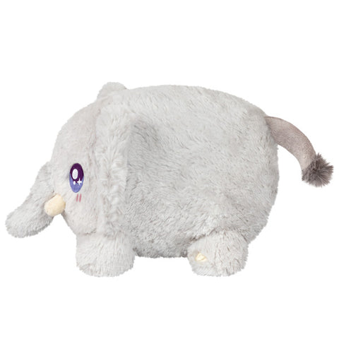 Image shows a side view of the stuffed elephant. It is very round.