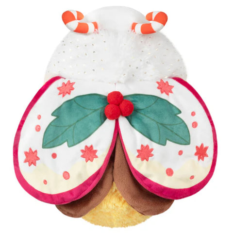 Image shows a top-down view of the stuffed festive moth. It shows its wings in detail, green leaves with red details.